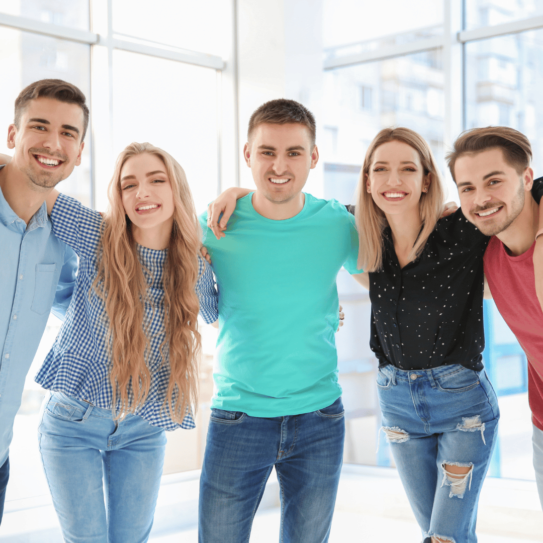 Group For Young Adults Standing Next To Each Other After Successfuccly Signing Up For Dfsin Insurance In Toronto From Orlando Ali Financial, Ontario