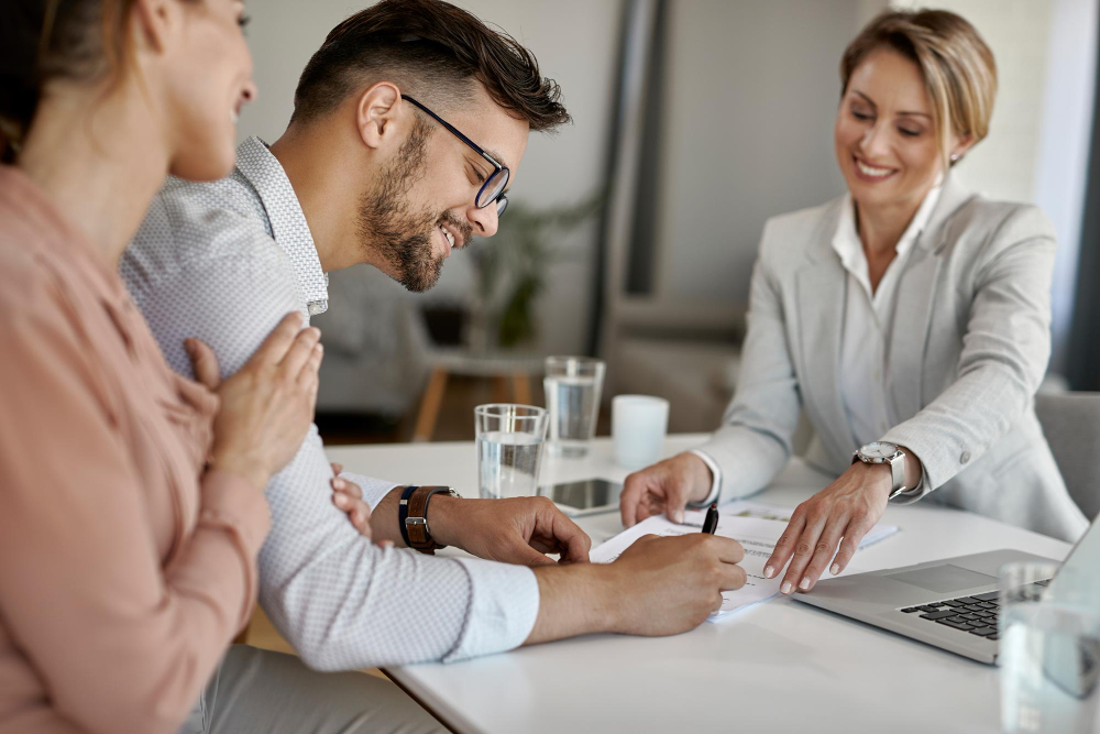 Happy Man His Wife Having Meeting With Financial Advisor Signing Agreement Office